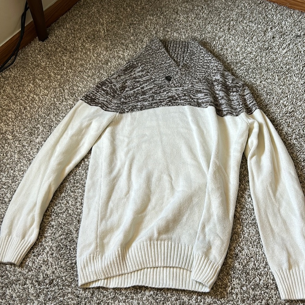 White and brown sweater